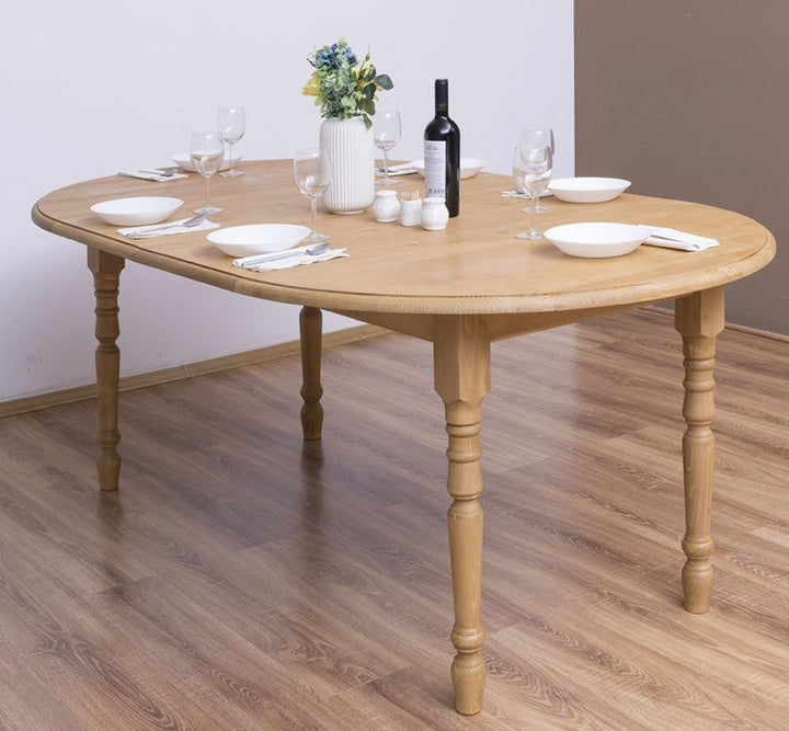 Table extensible en pin massif avec plateau en pin, vue latérale avec rallonges installées