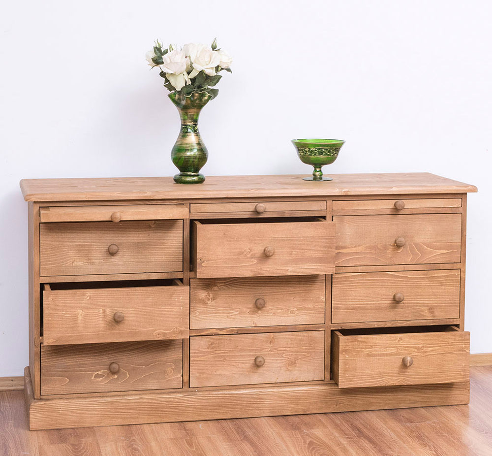 Commode en pin massif à 9 tiroirs avec plusieurs tiroirs ouverts