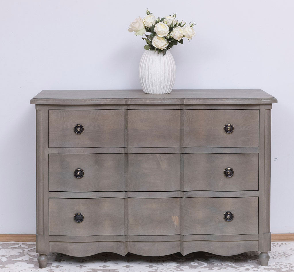 Commode en pin massif largeur 130 cm avec 6 tiroirs galbés vue de face finition Chêne brun