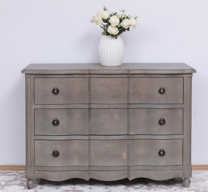 Commode en pin massif largeur 130 cm avec 6 tiroirs galbés vue de face finition Chêne brun