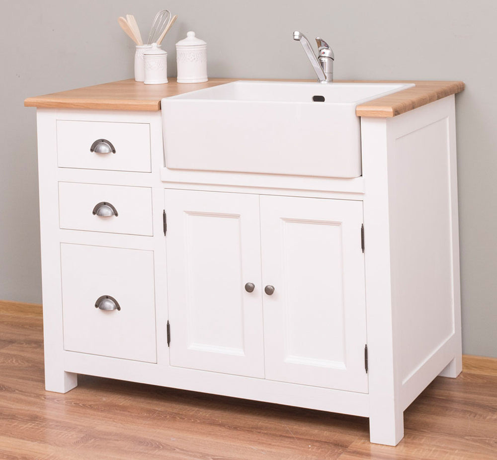 Meuble bas de cuisine évier en pin massif avec vasque en place, vue de face.