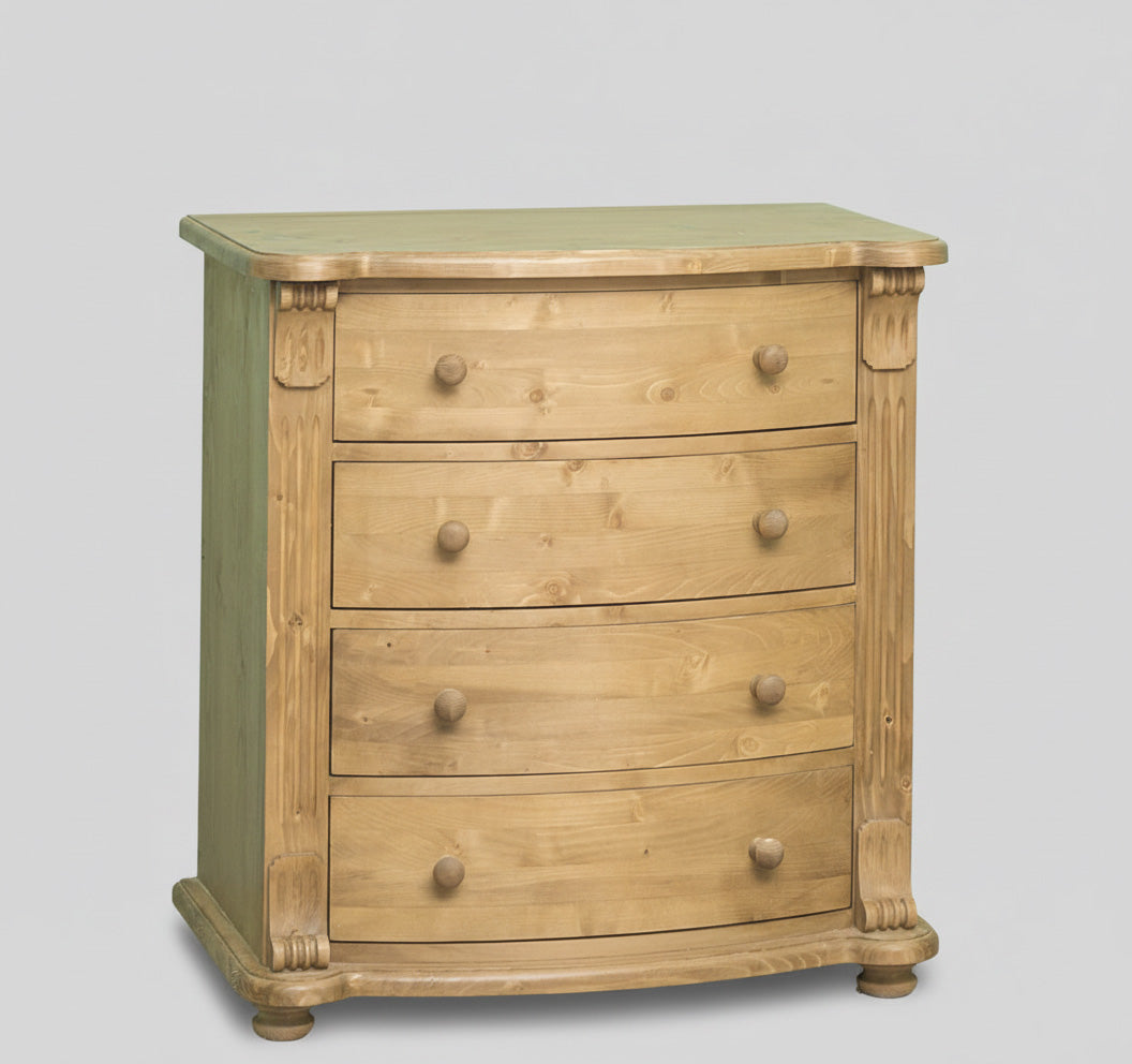 Commode en pin massif largeur 80 cm avec 4 tiroirs galbés vue de face finition Ciré miel clair