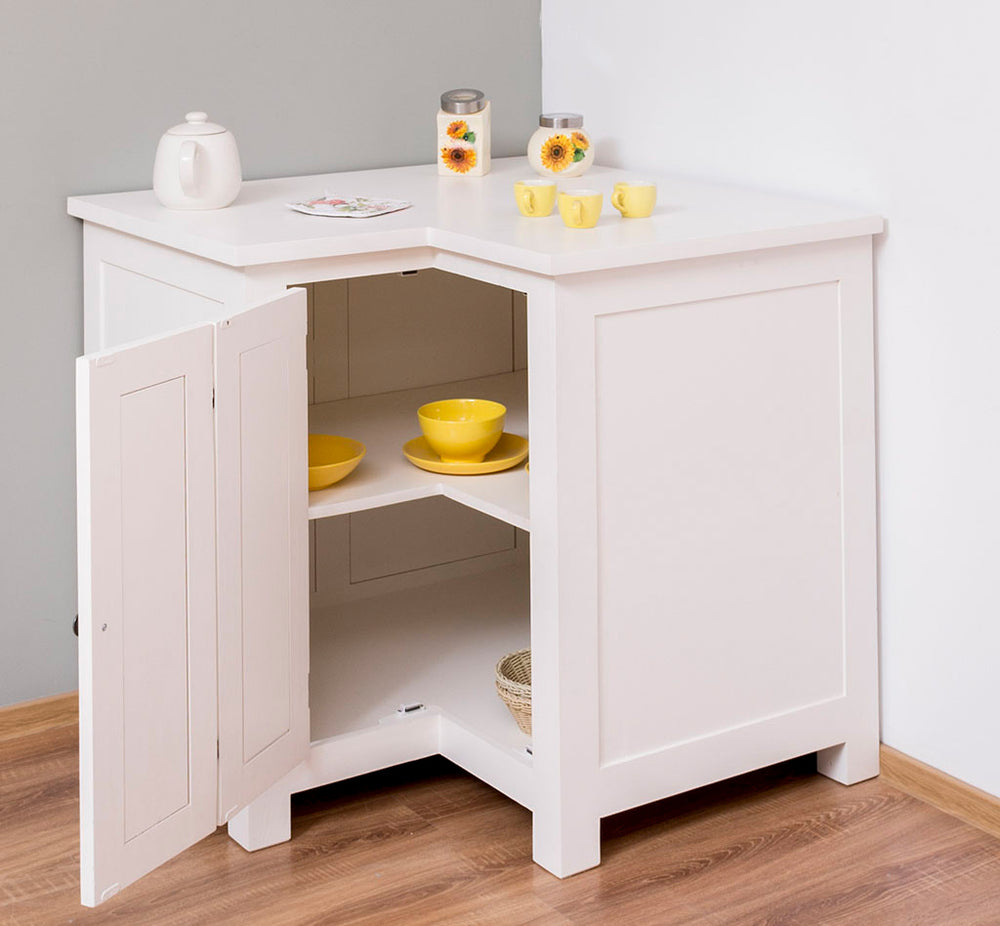 Meuble bas de cuisine d’angle en pin massif, vue en perspective montrant la forme d’angle.