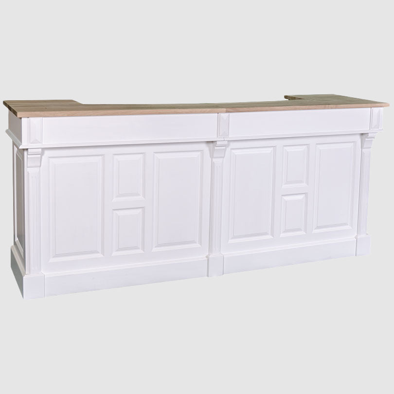 Vue de face d’un bar composé de deux modules alignés avec façades pleines à panneaux rectangulaires moulurés et plateau supérieur en bois clair