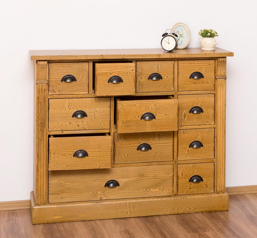 Commode en pin massif 120 cm avec 12 tiroirs finition Teinté miel et poignées coquille