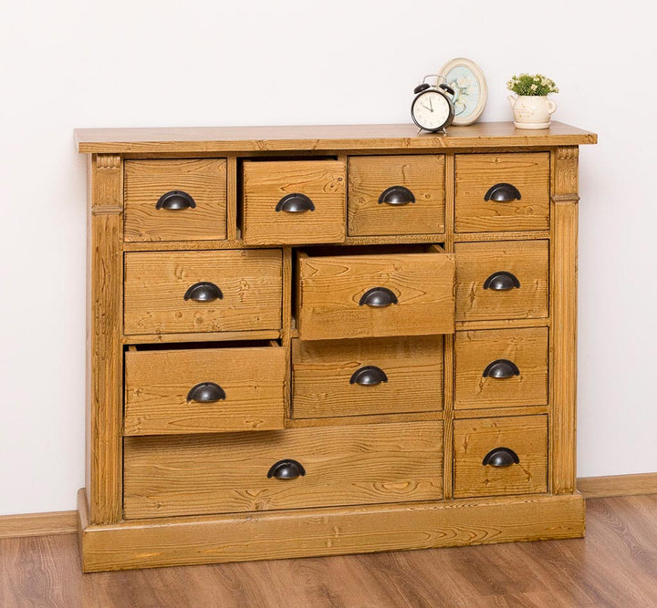 Commode en pin massif 120 cm avec 12 tiroirs finition Teinté miel et poignées coquille