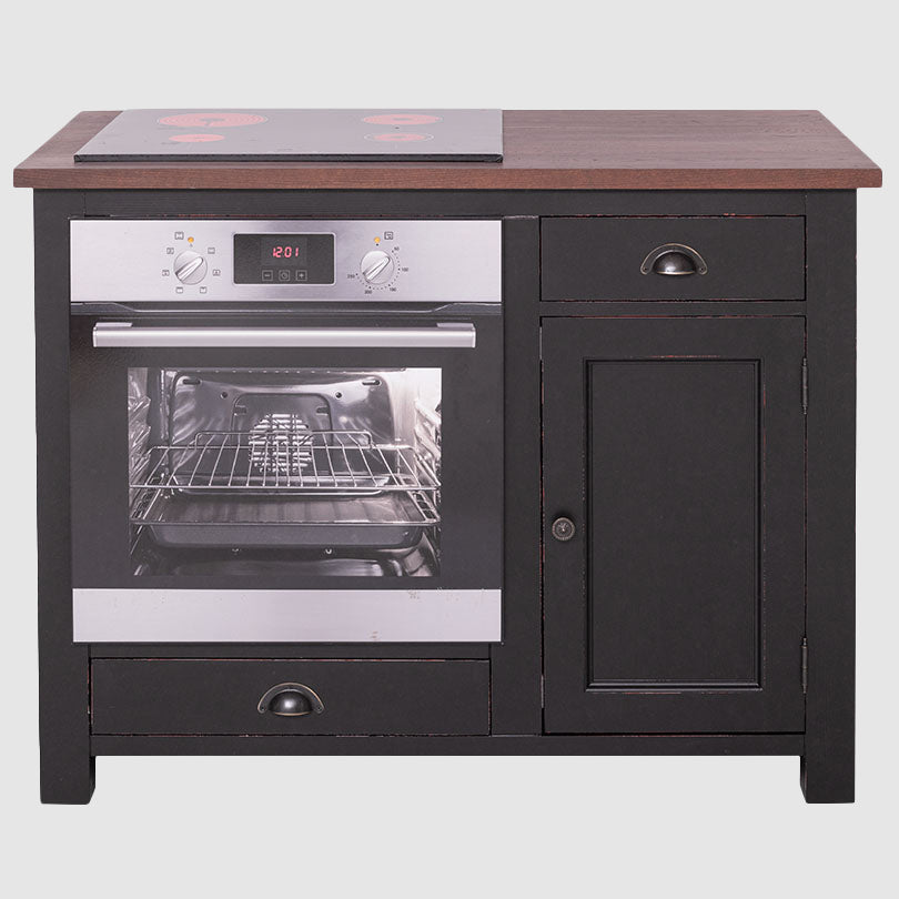 Meuble de cuisine noir comprenant un four encastré en inox, une plaque de cuisson vitrocéramique sur un plateau en bois brun, un tiroir et une porte latérale.