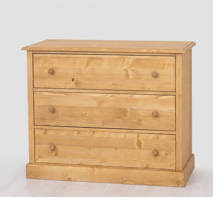 Commode 3 tiroirs en pin massif finition Ciré miel clair vue de face