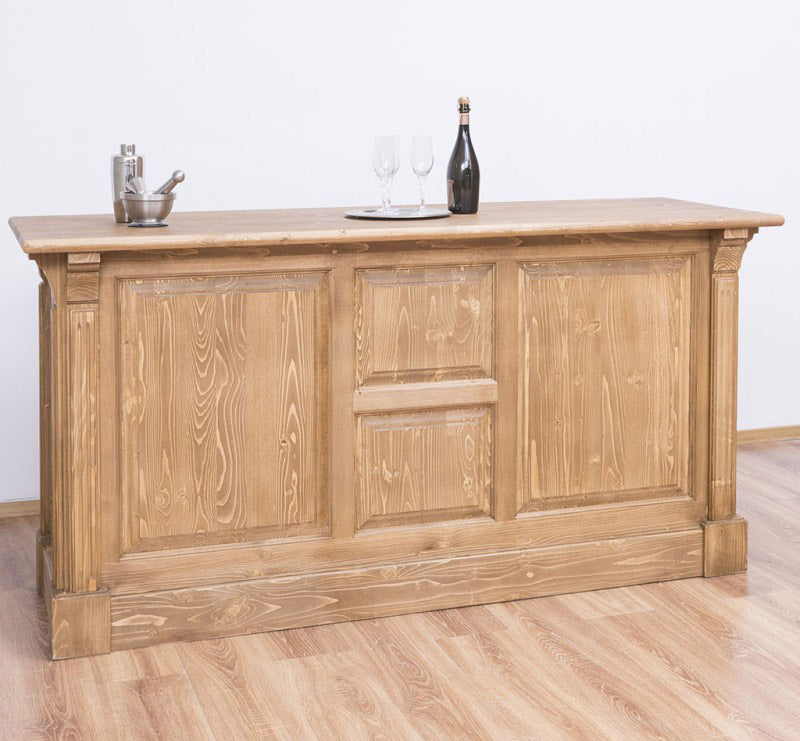 Comptoir en pin massif finition ciré miel clair avec rangements ouverts