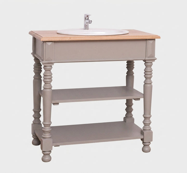 Console de salle de bain en bois peint gris avec double étagère et plateau en bois clair, design élégant et authentique.