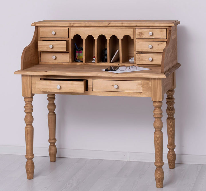 Bureau bonheur du jour en pin massif finition bois naturel avec 8 tiroirs, largeur 109 cm.
