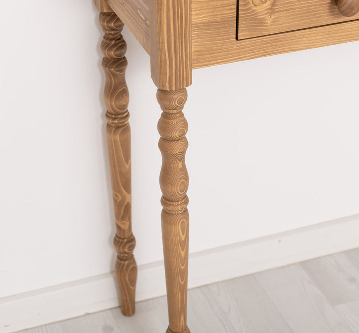 Console en pin massif avec 3 tiroirs.