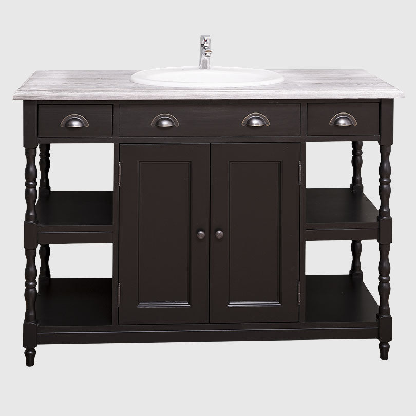 Meuble de salle de bain en bois noir avec vasque encastrée blanche et plateau effet bois vieilli.