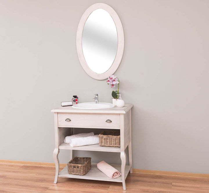 Meuble sous-vasque en pin massif avec miroir ovale dans une salle de bain — Le Grenier Campagnard