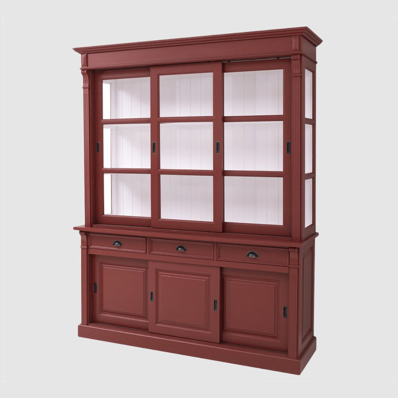 Vaisselier en pin massif avec portes coulissantes vitrées et rangements fermés en partie basse.